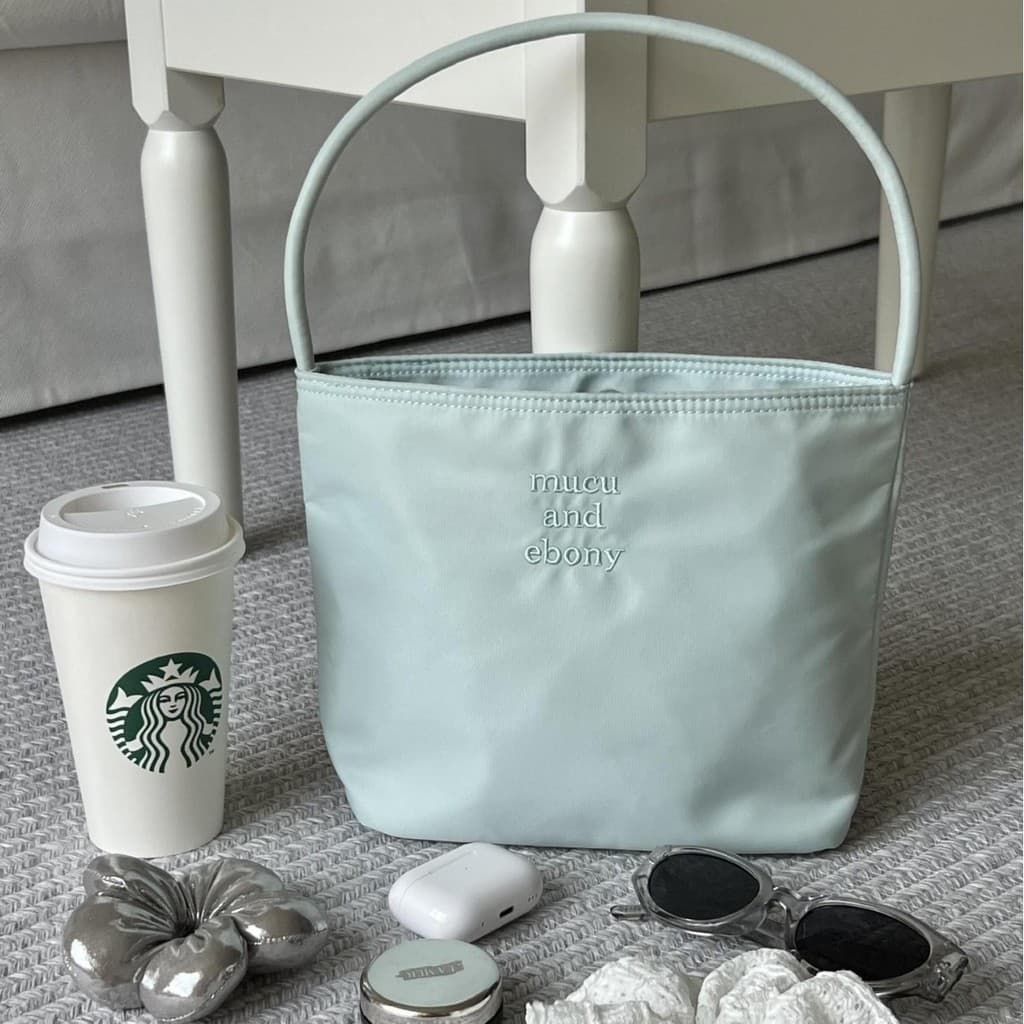 Bolsa bucket popular de 2026 para mulheres, bolsa de mão simples e versátil, bolsa de nylon para usar sob o braço.