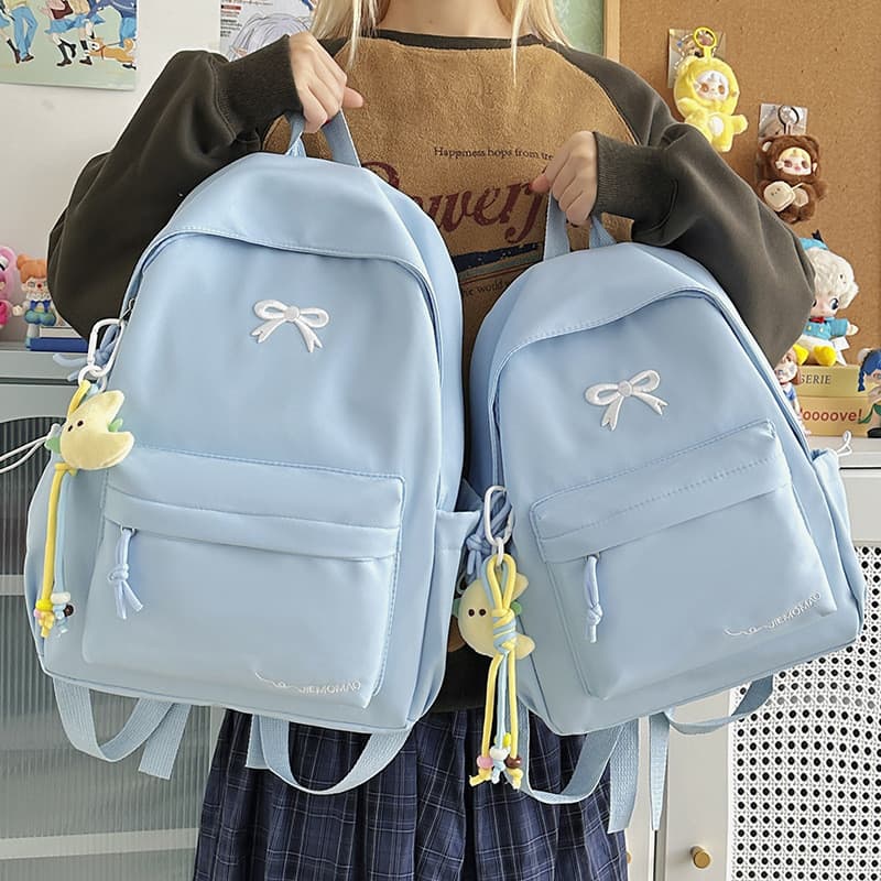 Estilo suave leite fufu estilo coreano macio menina Bowknot bordado férias pai-filho mochila de viagem