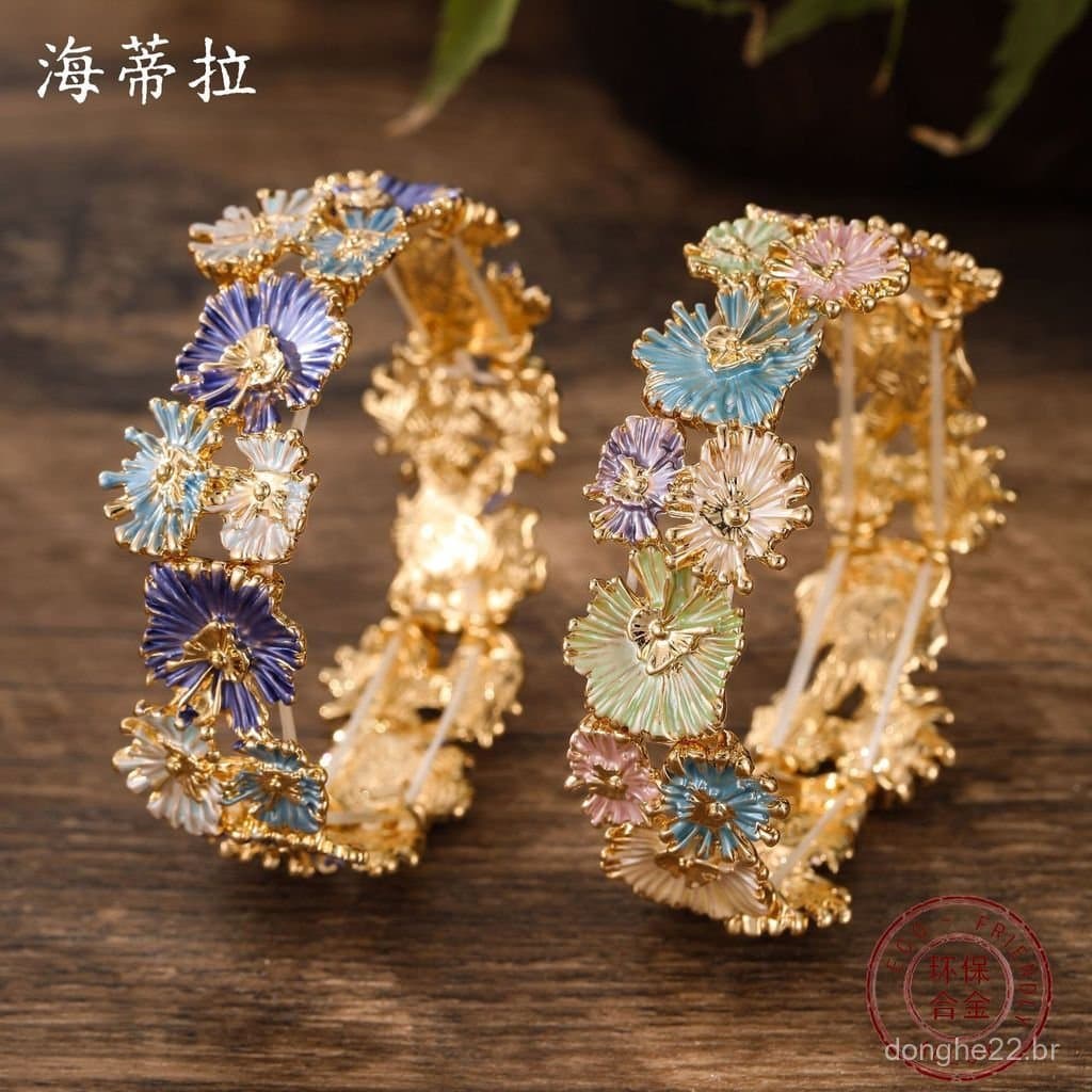 Pulseira elástica feminina, com padrão floral irregular em esmalte, feita de liga de zinco.