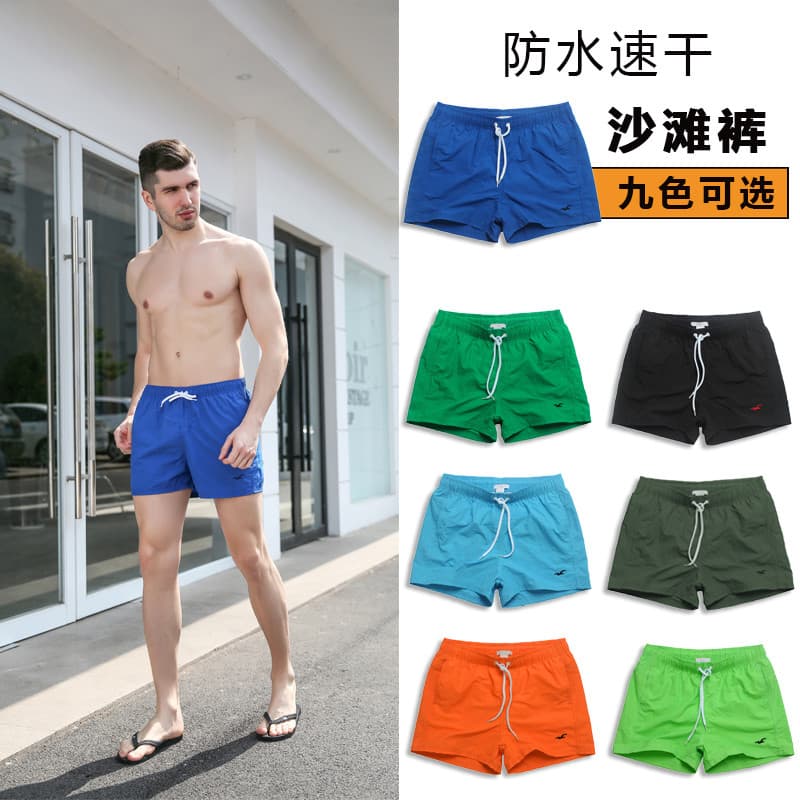 Calças de praia de secagem rápida homens férias à beira-mar calças de três pontos shorts esportivos homens correndo Fitn