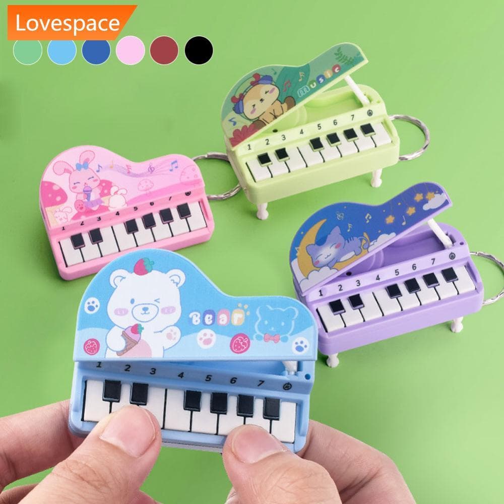 LS-STORE Mini Piano Eletrônico Com Treinamento De Luz Dedo Chaveiro Teclado Instrumento Musical Portátil Brinquedo C2E6