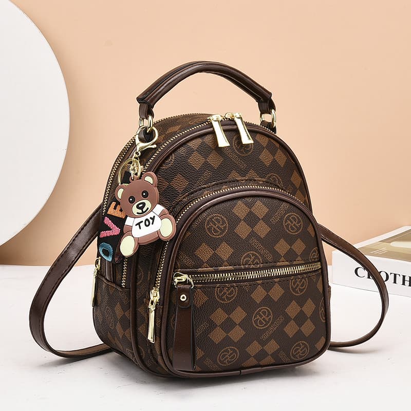 Multifuncional mochila de um ombro feminino 2026 novo estilo versão coreana saco de dupla utilização saco de escola moda