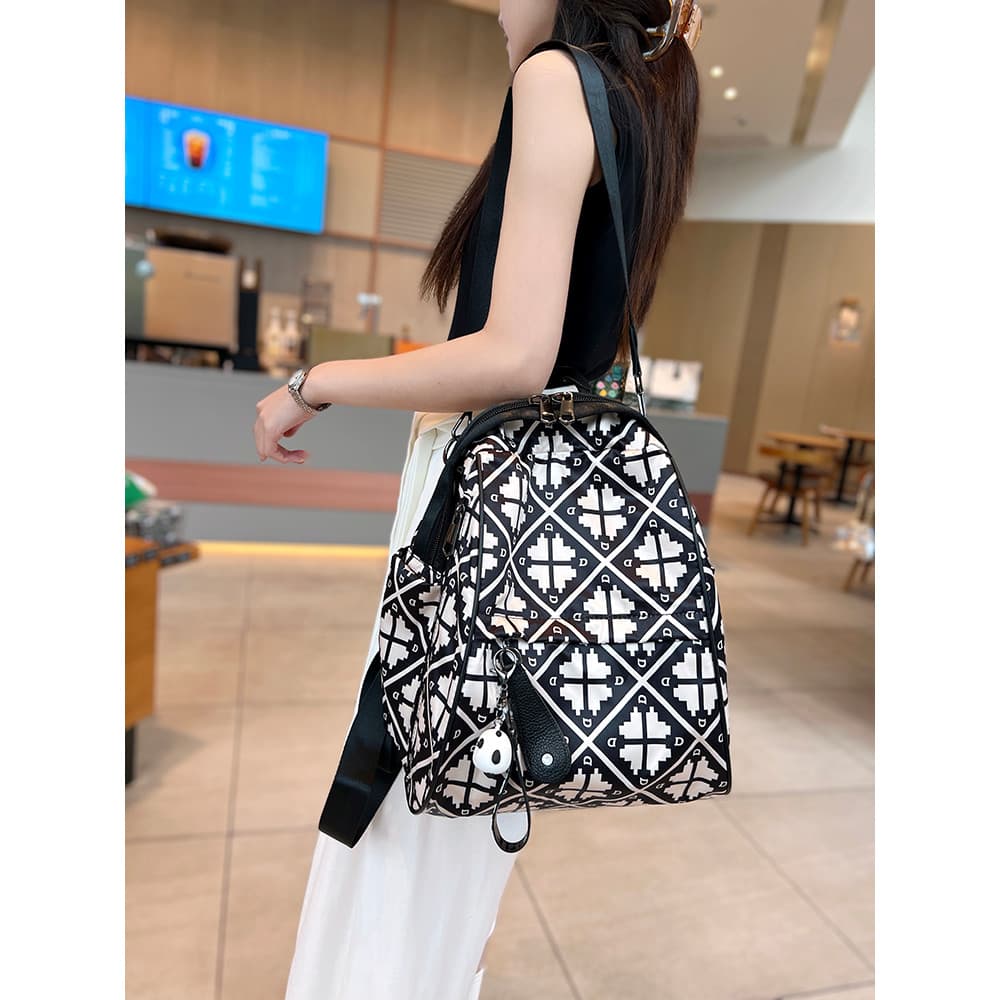 Moda impressa mochila feminina 2025 novo estilo Oxford pano grande capacidade lazer viagem mochila leve saco de viagem n