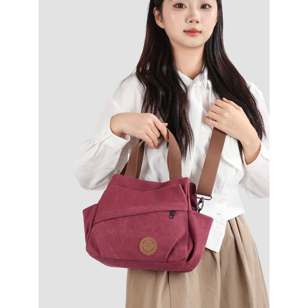 Bolsa de lona feminina 2026 novo estilo All-Match Commuter portátil ombro saco do mensageiro lazer viagem mãe saco peque