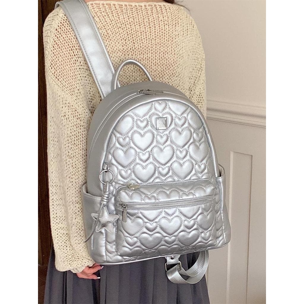 Muzi rua prata amor mochila feminina 2026 novo estilo moda Casual saco de viagem High-End sentimento mochila de grande c