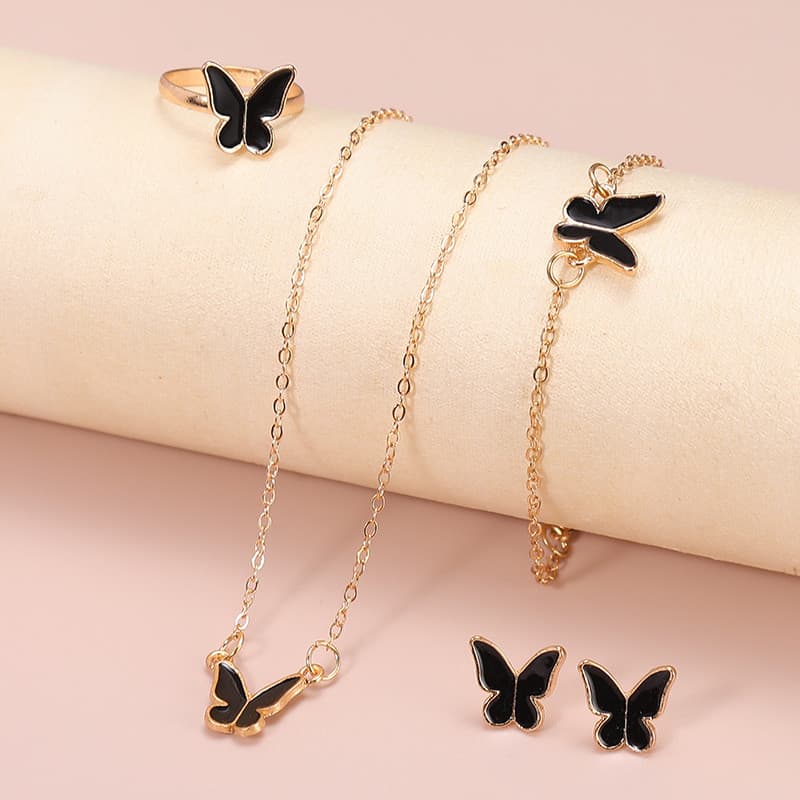 Novo europeu americano jóias feminino moda temperamento único borboleta colar brincos anel pulseira 4 peças conjunto ata