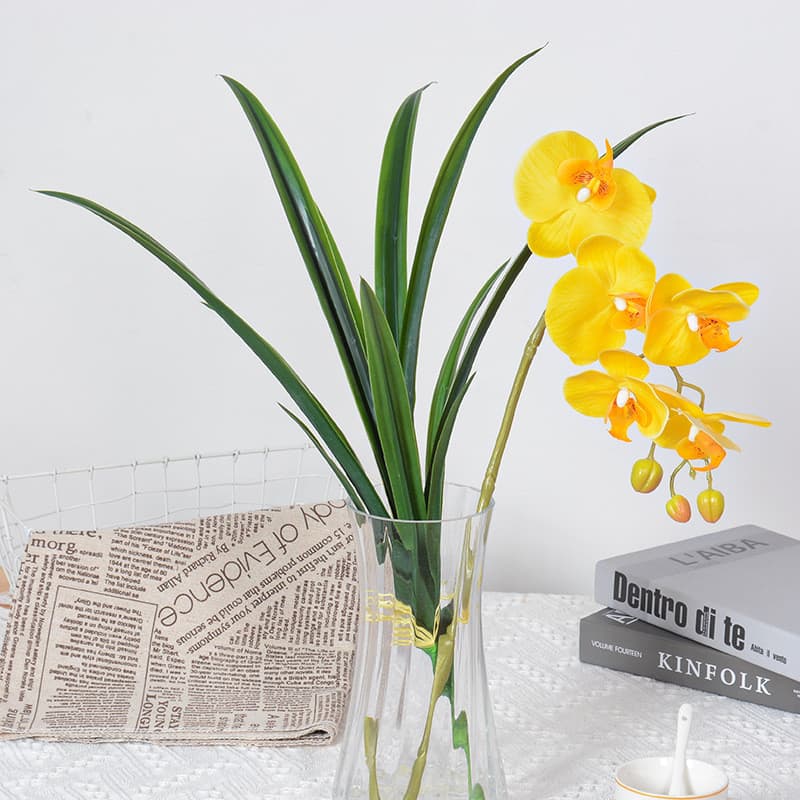 Flores artificiais Espada artificial transfronteiriça Folha de orquídea Folha Huilan com grama flores artificiais Arranj