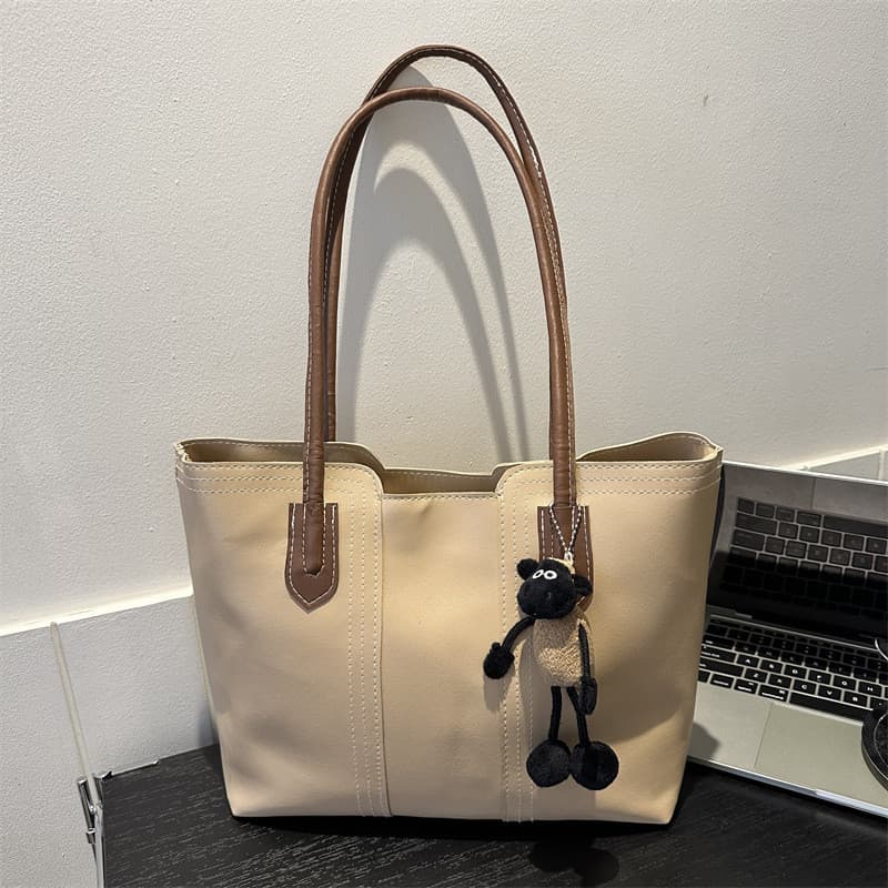 High-End moda grande capacidade 2026 senhoras novo estilo sacola luz luxo nicho bolsa de ombro estudante universitário C