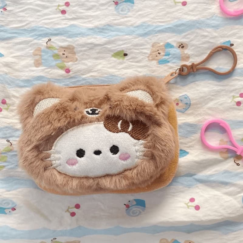 Uma carteira redonda da Sanrio com um estilo de desenho animado fofo, também adequada como bolsa de pelúcia para guardar