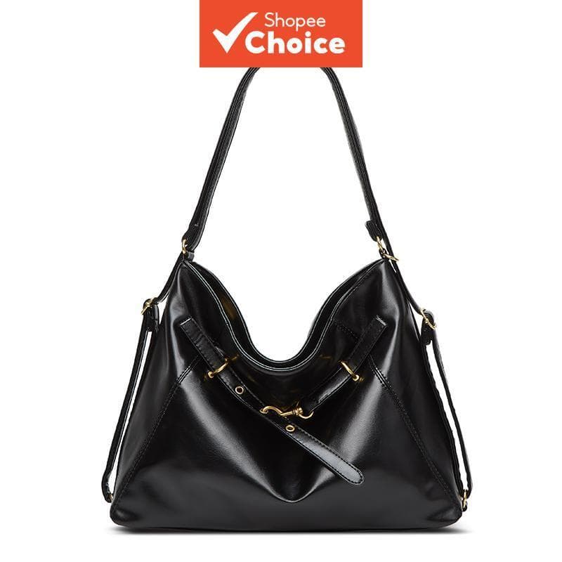 Bolsa tiracolo feminina com alças ajustáveis, acabamento brilhante e grande capacidade. Ideal para o dia a dia, passeios
