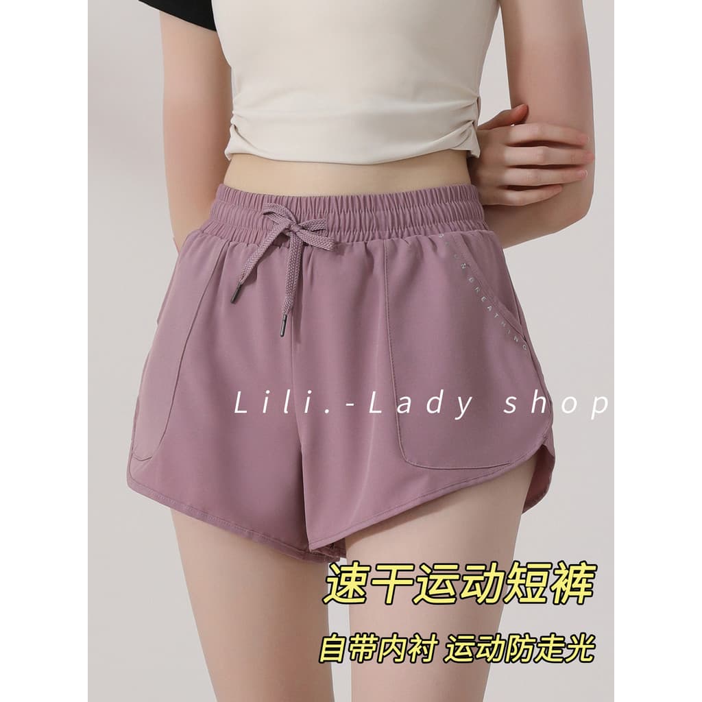 Shorts esportivos de secagem rápida feminino profissional maratona treinamento de Fitness calças de corrida Anti-exposiç