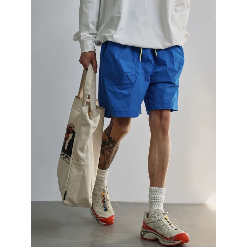 Verão ao ar livre zíper funcional náilon de secagem rápida Shorts casuais macacão de praia masculino cordão casual calça