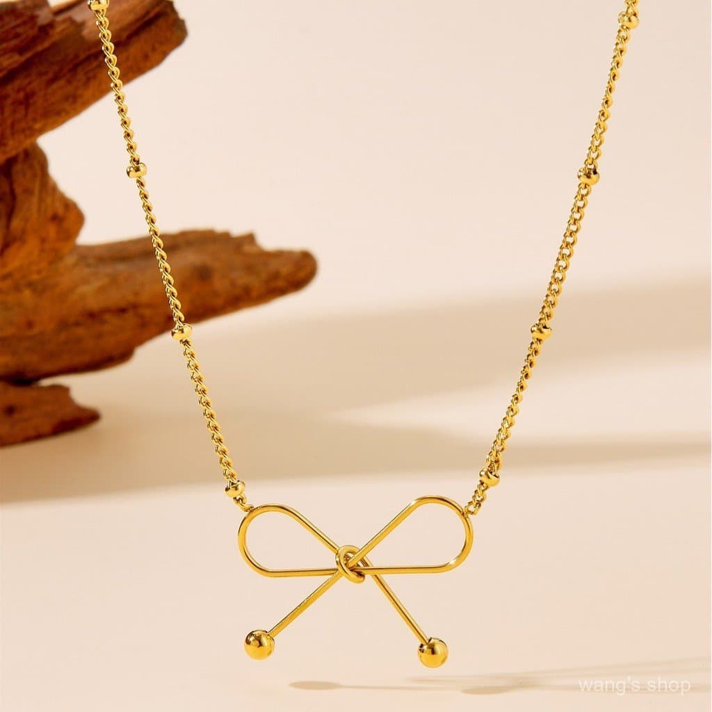 Conjunto de Joias Femininas de Aço Titânio Dourado com Laço, Não Desbotável, Novo, de Alta Qualidade - Atacado - Pulseir