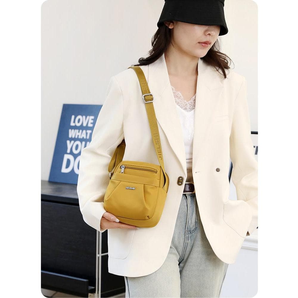 2025 temperamento moda saco do telefone móvel feminino novo estilo náilon bolsa de ombro Casual All-Match senhoras saco