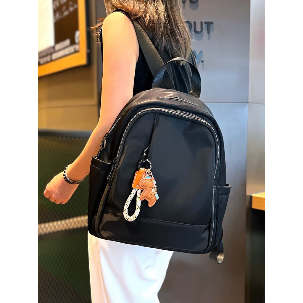 Multi-compartimento Oxford pano mochila feminina 2026 novo estilo simples à prova dwaterproof água médio mochila lazer v