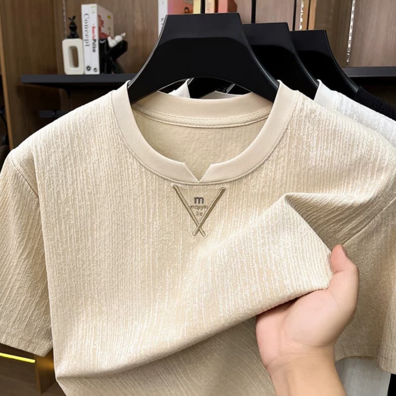 2026 verão novo estilo de alta qualidade em torno do pescoço texturizado manga curta camiseta masculina solta Casual cor