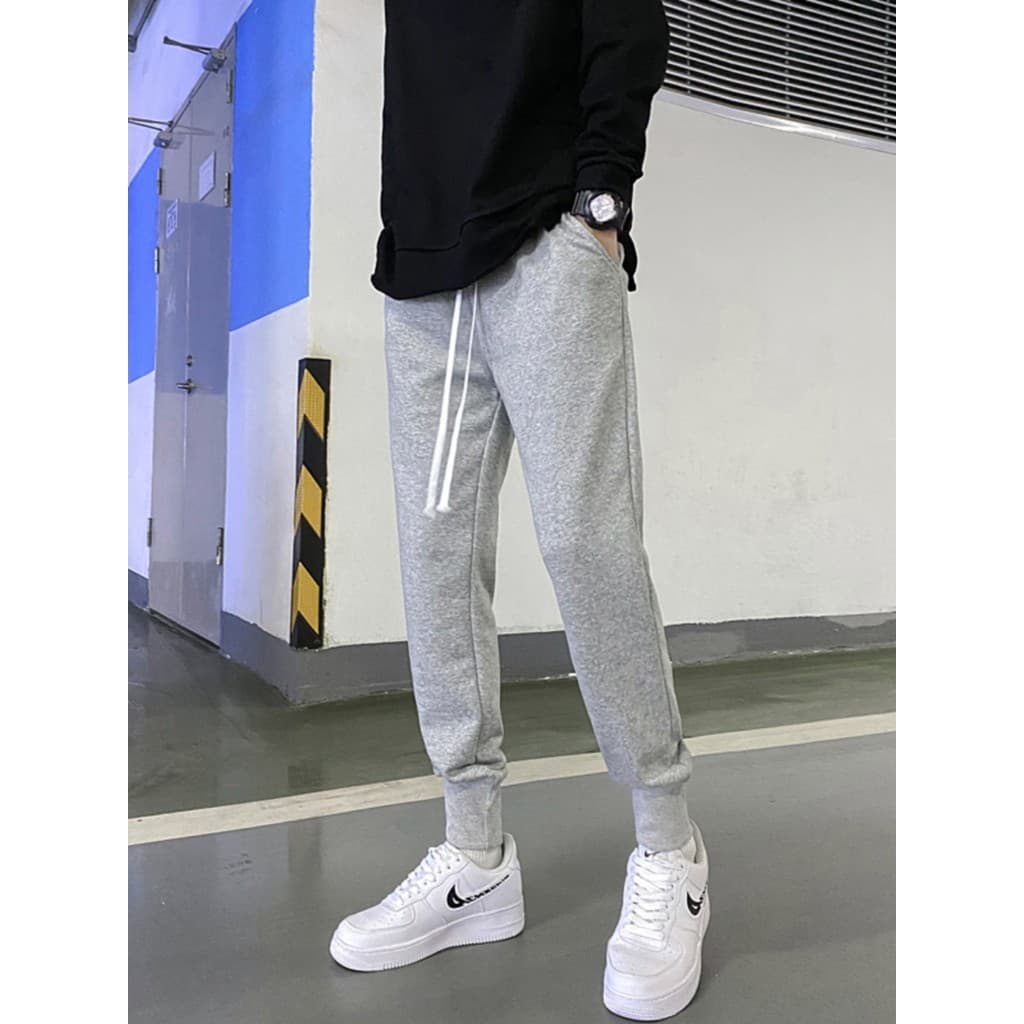 Calças masculinas calças esportivas masculinas High street magro-fit calças masculinas cordão cor sólida street Wear na