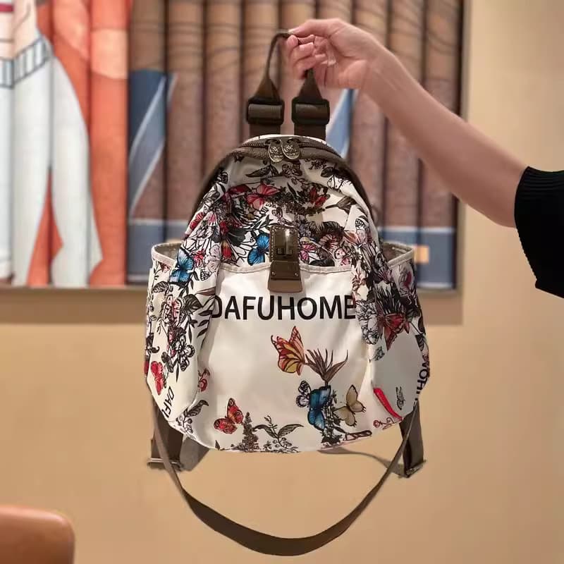Grande capacidade lazer passeio mochila de viagem feminina 2026 novo estilo moda viagem leve Oxford pano senhoras mochil