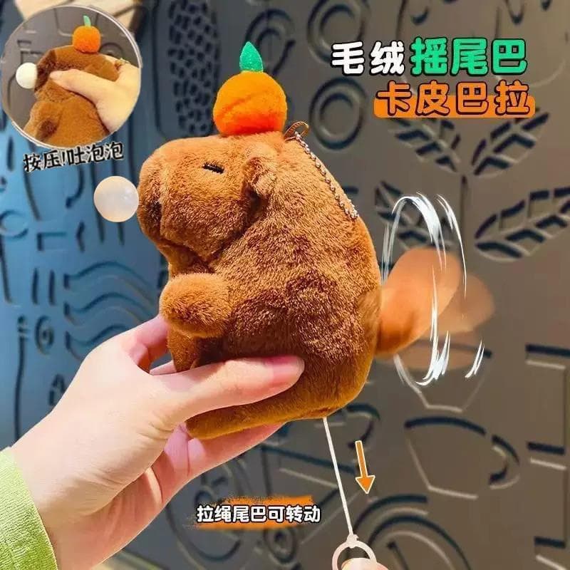 Desenhos animados de pelúcia cuspir bolha Kapibara boneca bonito capivara chaveiro pingente balançando cauda voz boneca