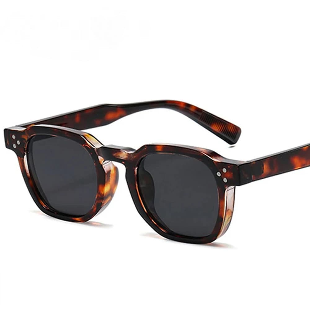 Óculos de moda retrô unissex com detalhes de rebites, design oval, padrão de estampa de leopardo e recurso de bloqueio d