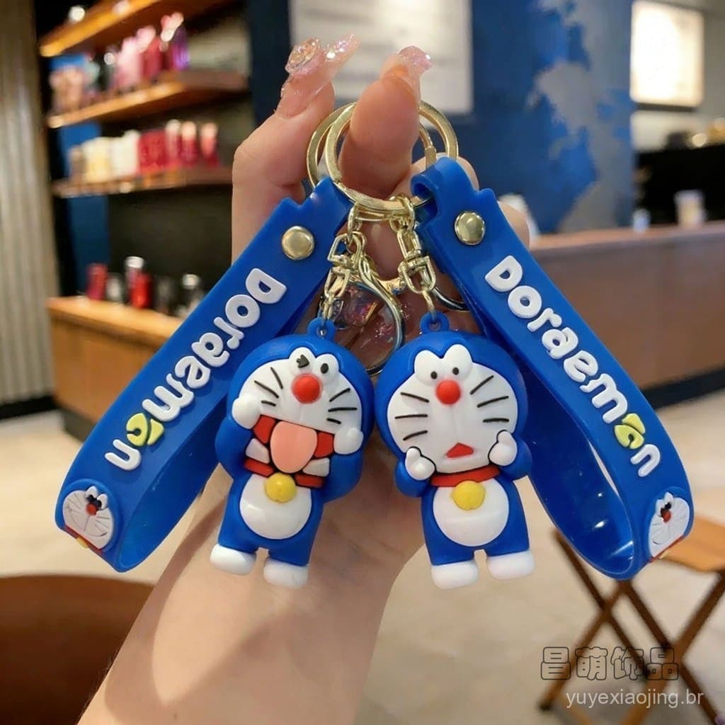 Chaveiro de boneco de rosto azul e orelhas redondas, figura de desenho animado para mochilas e acessórios de carro.