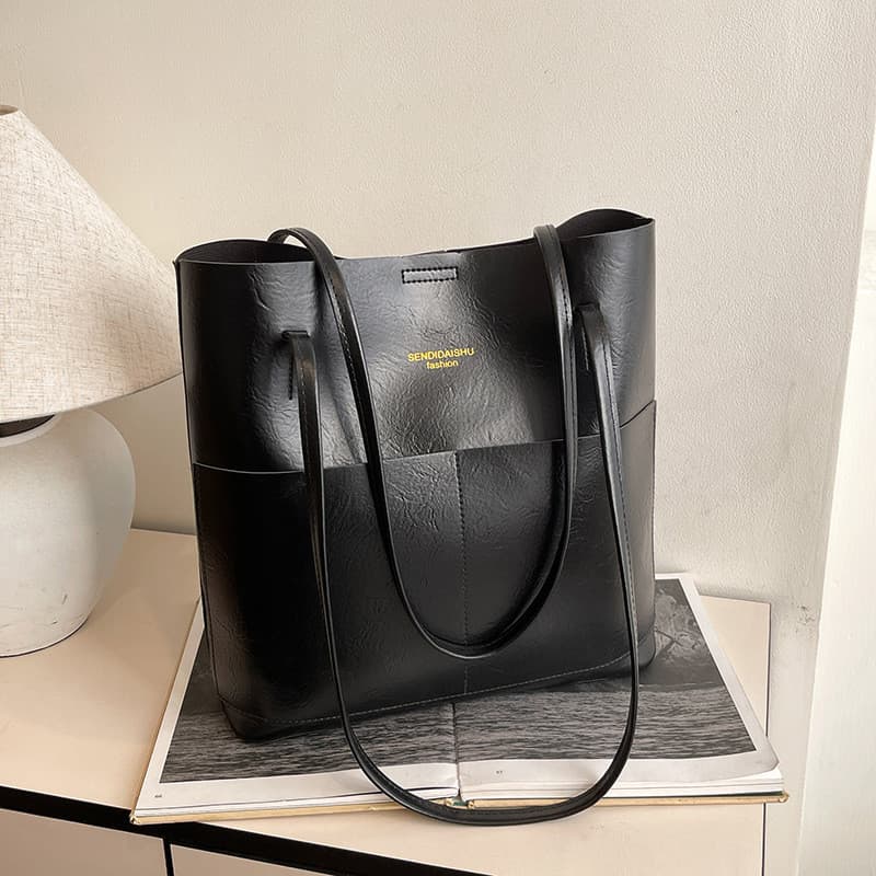 Textura de alta qualidade bolsa de grande capacidade feminina 2026 novo estilo Retro simples Commuter bolsa de ombro ced
