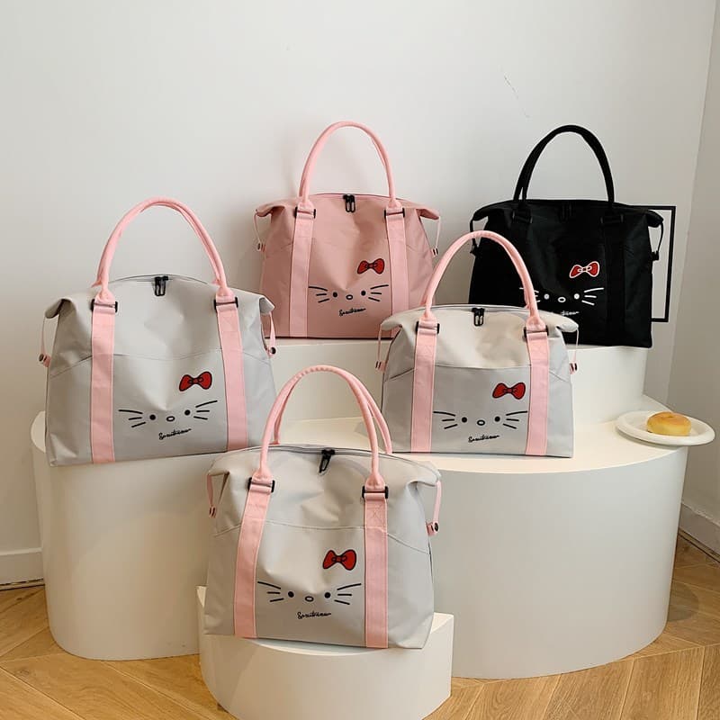 Versão coreana bolsa de desenho animado de curta distância de grande capacidade, leve, viagem de negócios, bolsa de ombr