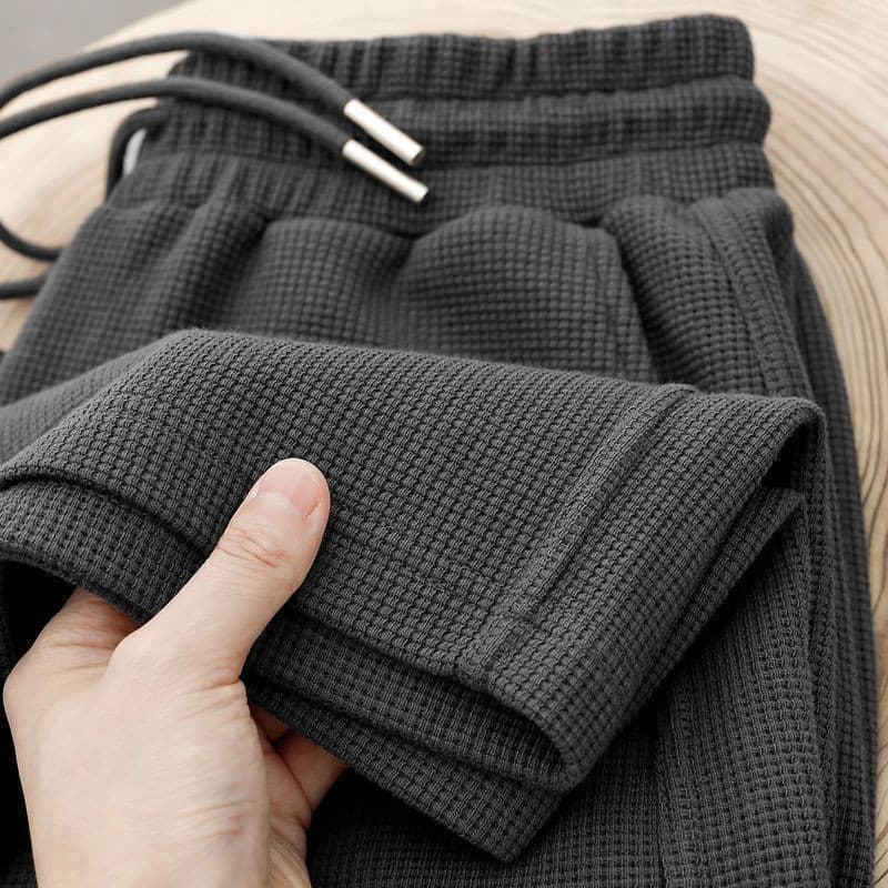 Vazamento escolhendo Waffle calças casuais masculinas 2025 primavera novo estilo esportes soltos calças de tamanho grand