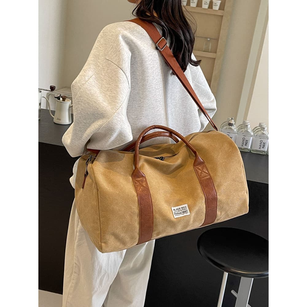 Bolsa de lona de grande capacidade feminina 2026 novo estilo moda Casual bolsa de viagem de curta distância masculina bo