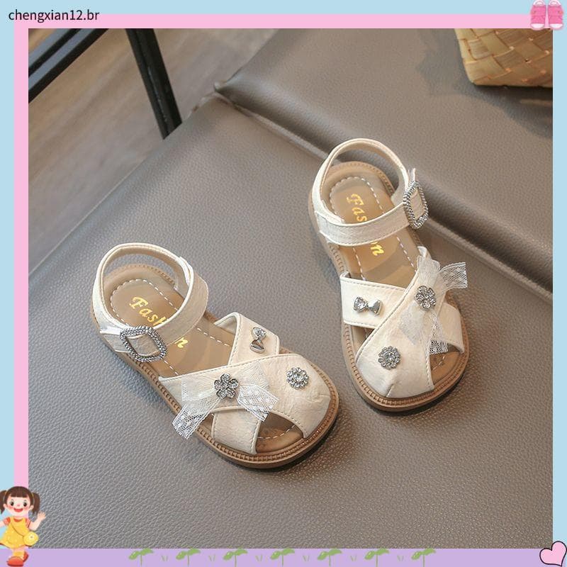 Meninas sandálias casuais crianças Baotou arco sapatos de praia 2026 verão novo estilo meninas Super macio sapatos antid