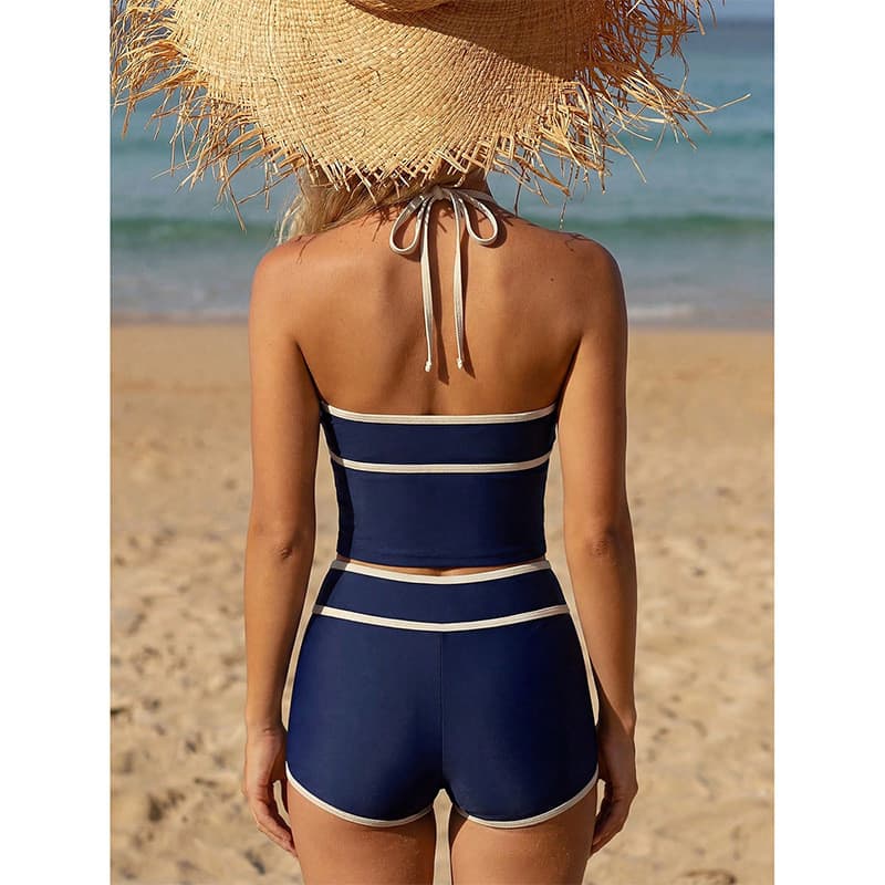 Biquíni de duas peças com amarração e blocos de cor para mulheres, adequado para férias e uso na praia.