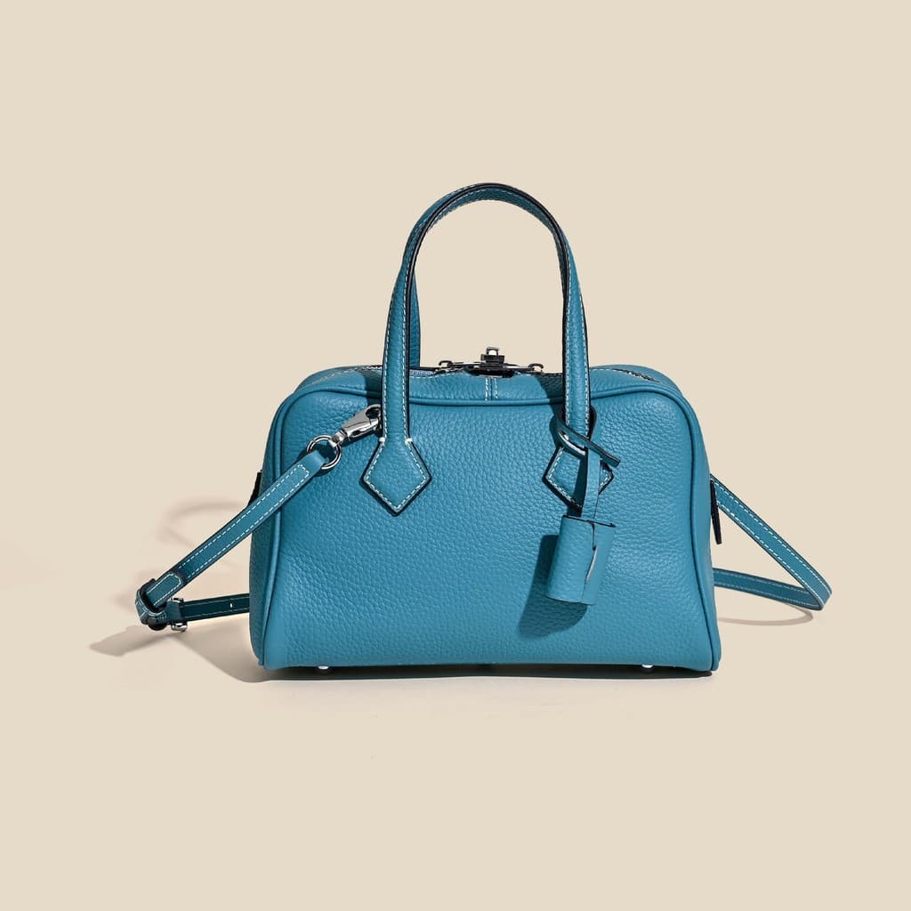 Novo estilo bolsa feminina de couro genuíno primeira camada TC couro Victoria pequena sensação High-End bolsa de ombro p