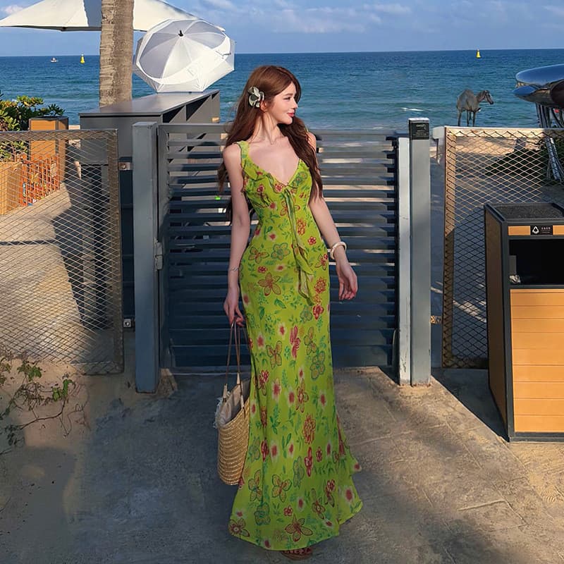 Um doce pêssego yikett estilo férias com decote em V Floral estilingue vestido feminino aparência mais fina