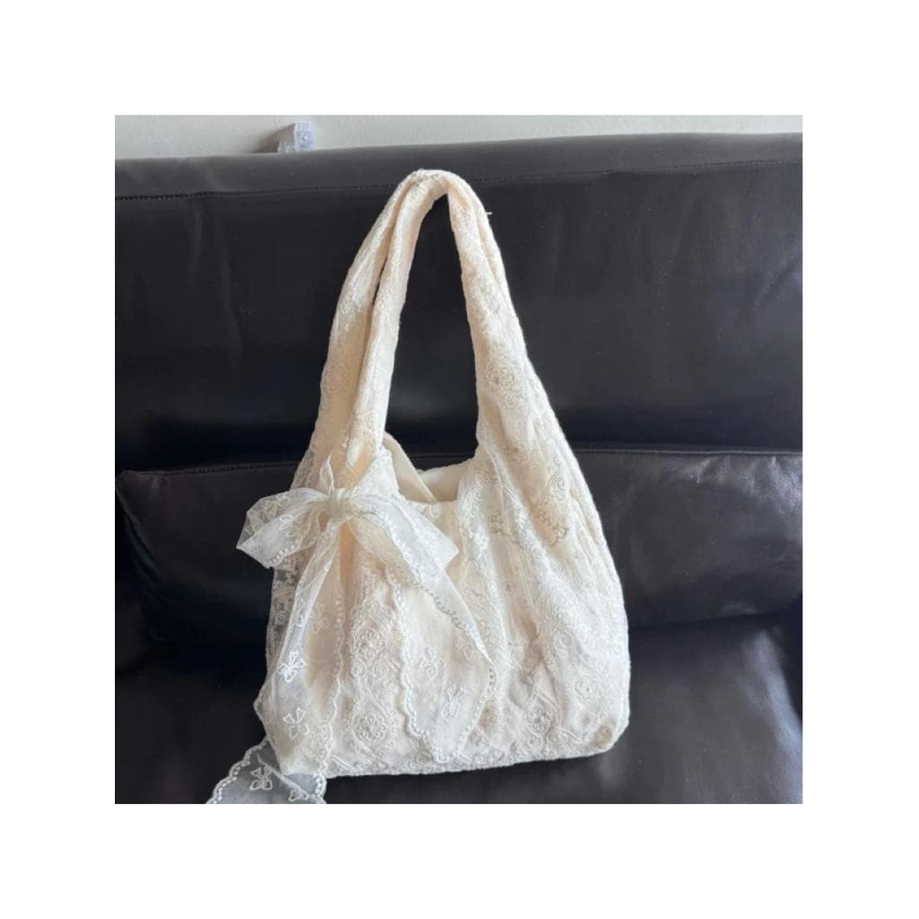 Estilo coreano fresco laço flor pano saco 2025 verão novo estilo grande capacidade Super fada um ombro Tote Commuter axi