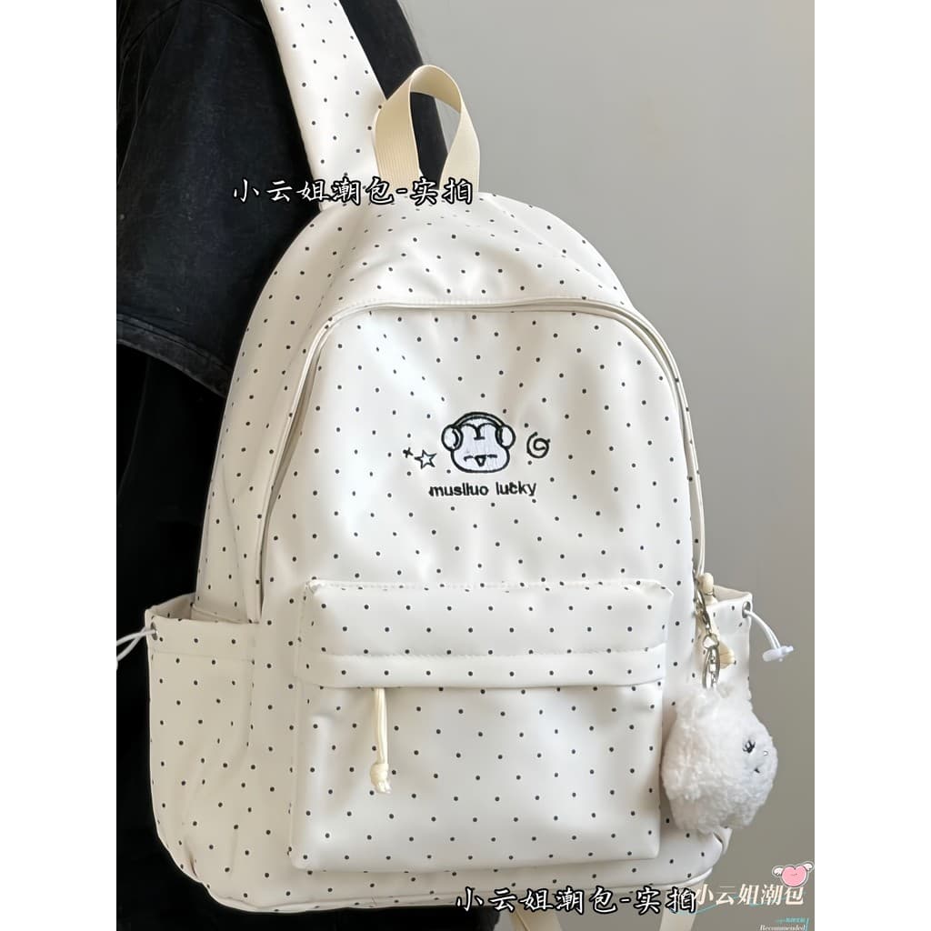 Novo estilo mochila feminina quatro quinto sexta série versão coreana nicho ins bolinhas júnior escola secundária faculd