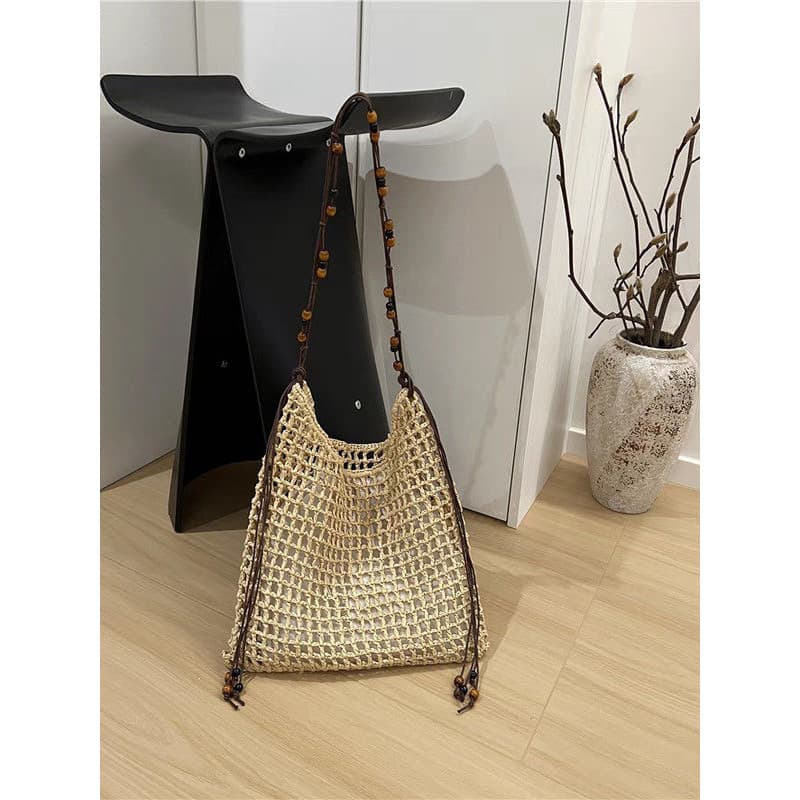 Novo estilo oco mão-tecido sacola axilas saco nicho Design palha tecido grande capacidade frisado bolsa de ombro