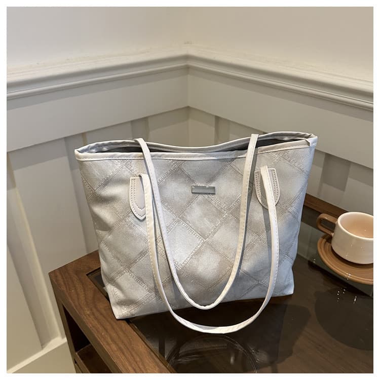Bolsa Tote feminina 2026 novo estilo grande capacidade Commuter saco verão Casual All-Match bolsa de ombro estudante uni