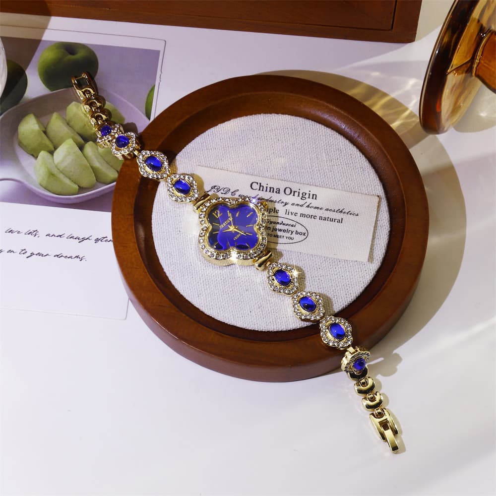 Relógio de pulso feminino popular com pulseira de strass de quatro folhas, elegante e simples, de alta qualidade, sofist
