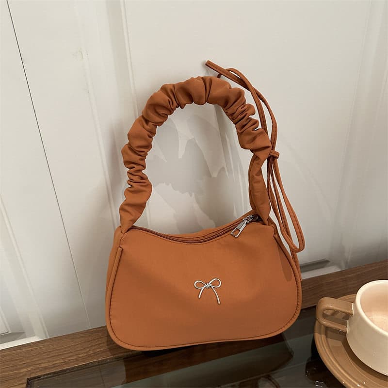 Bolsa bolsa transversal feminino Início da primavera novo estilo nicho francês Design de um ombro axilas saco na moda tr