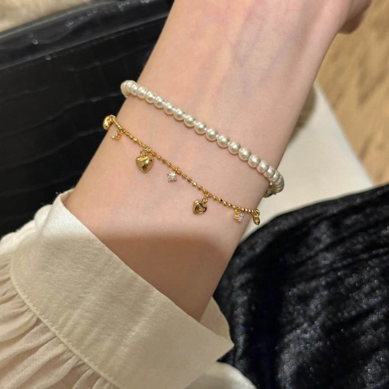 Pulseira de zircônia com borla em formato de coração para mulheres, delicada e moderna, joia de nicho e requintada XYWT