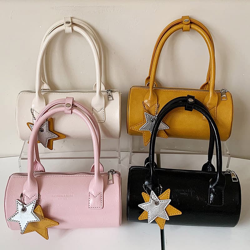 2026 novo estilo de alto valor personalidade bolinhas portátil travesseiro saco feminino Commuter bolsa ombro moda saco