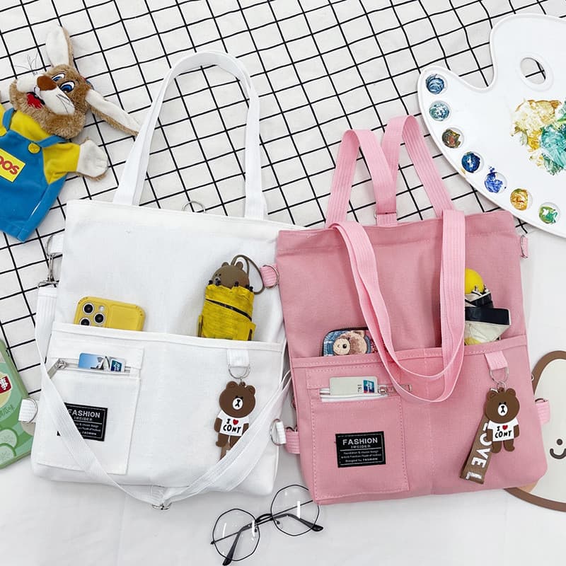 Bolsa mensageiro feminina estudante versão coreana bolsa de ombro de lona Campus bonito All-Match namoradas mesmo estilo