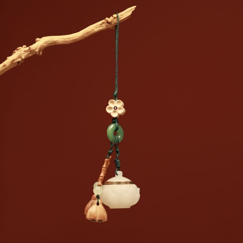 Sachê Aromático Luminoso Portátil com Formato de Lótus, com Borla e Pingente para Celular (acompanha um frasco com 5 esf