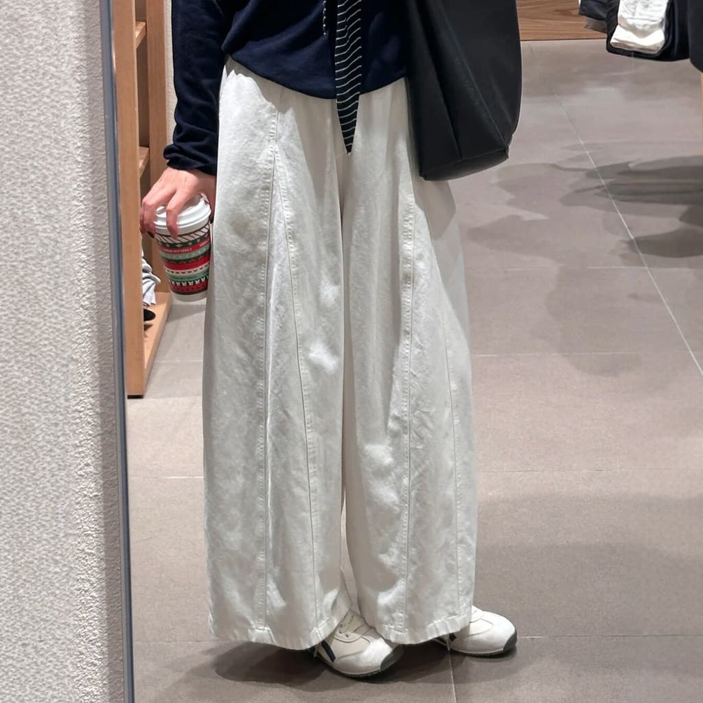 Calças femininas de corte curvo estilo japonês, modelo novo primavera/verão 2026, cintura alta, corte solto, tecido flui