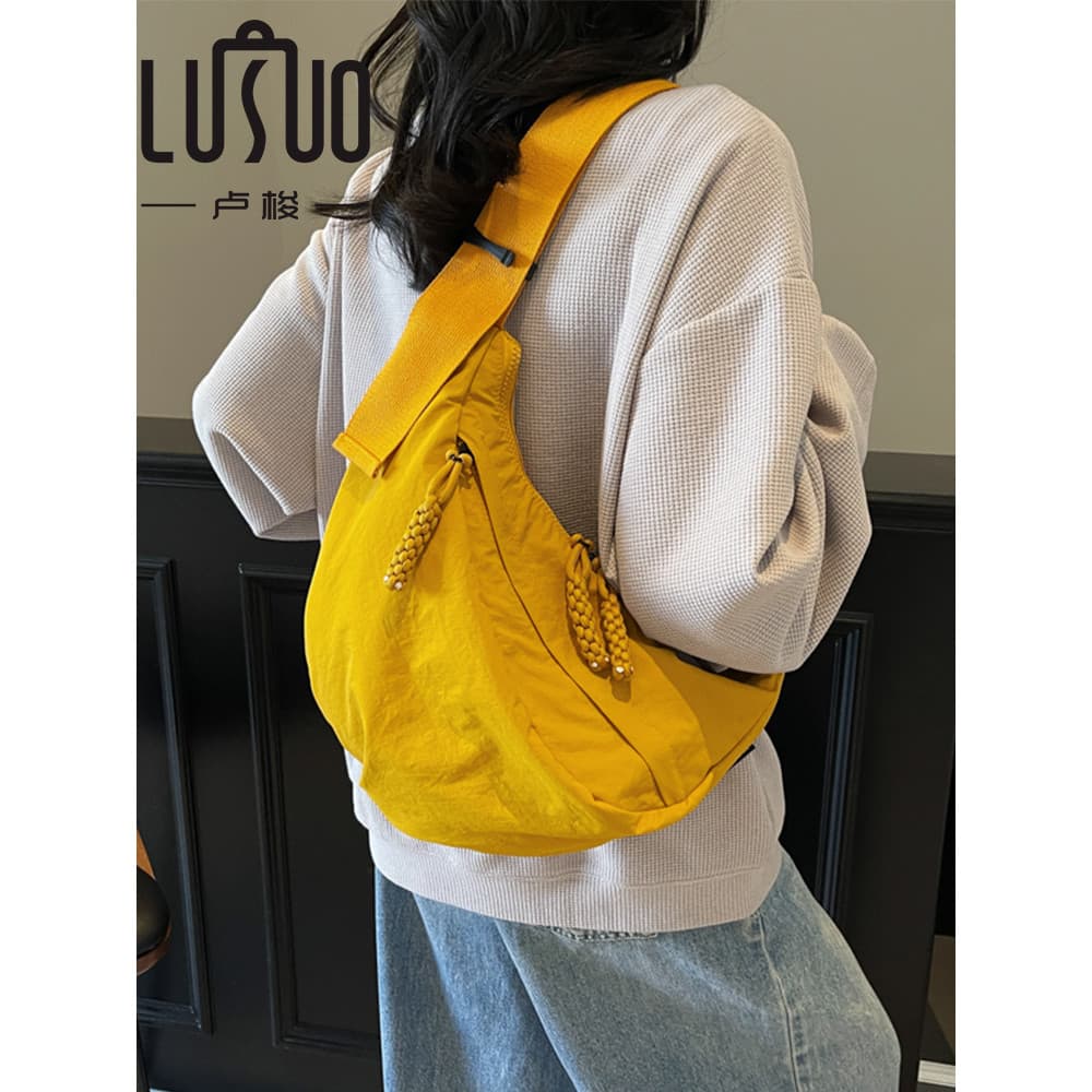 Saco de bolinho feminino mensageiro 2026 novo estilo mochila masculina esportes Casual saco de peito feminino pequeno mo