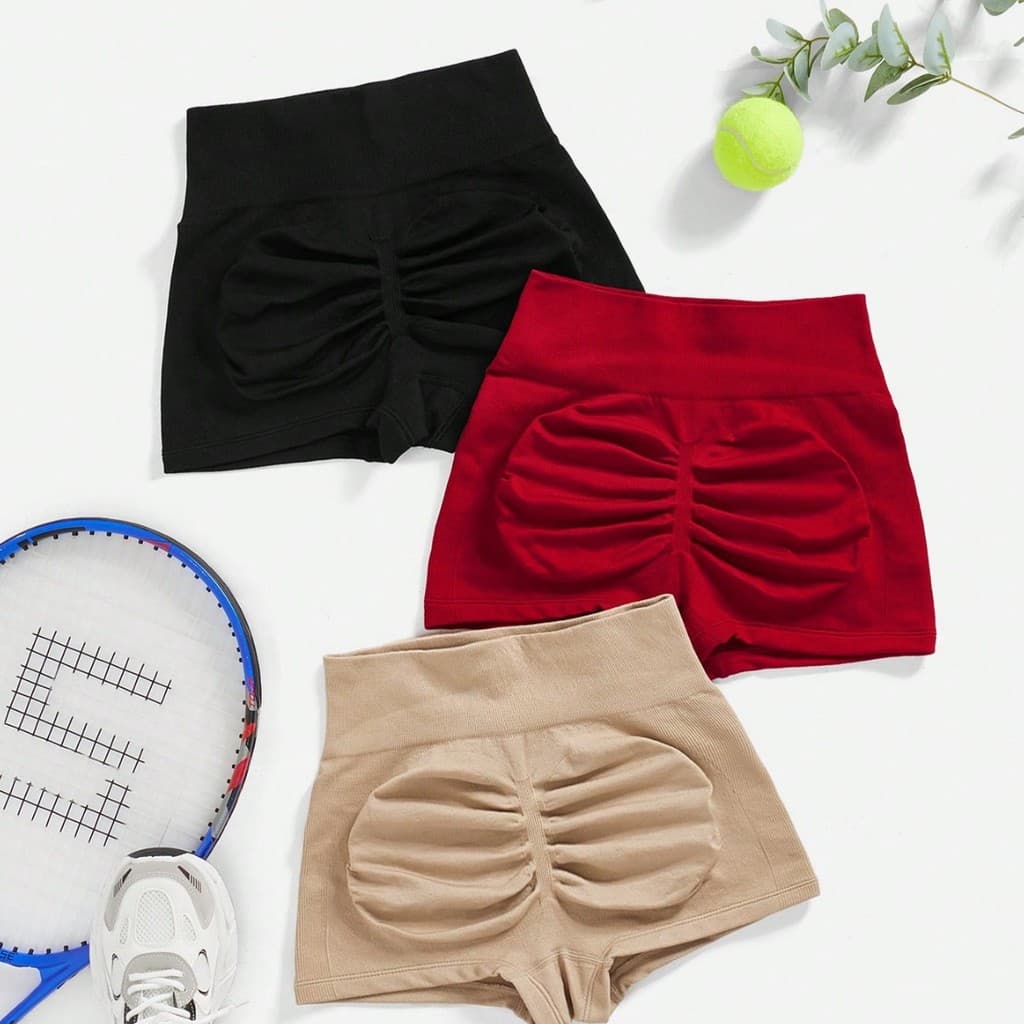 Shorts esportivos femininos Hip Lift nova cor respirável de secagem rápida calças de três pontos Yoga Fitness correndo