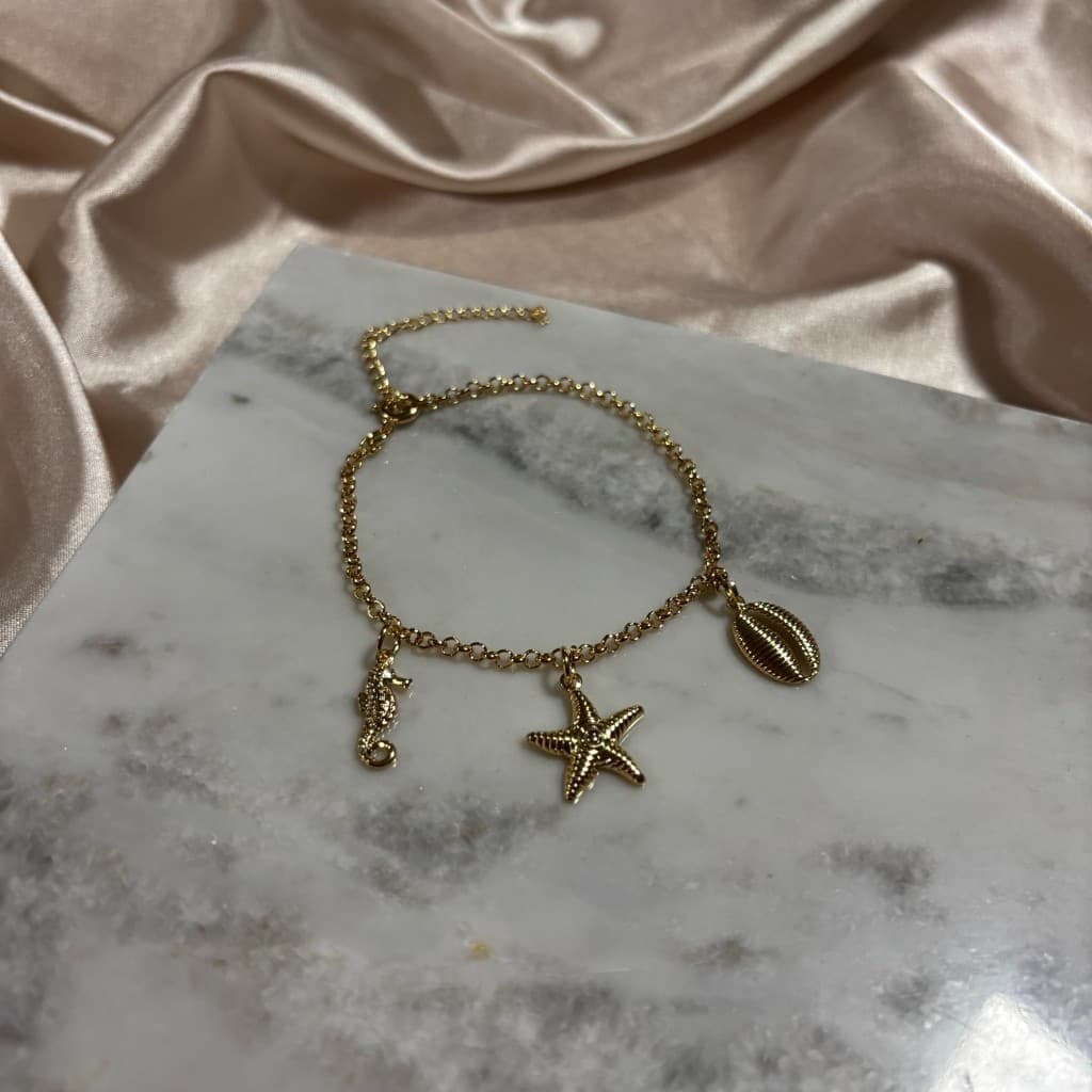 Pulseira Feminina Berloque Estrela do Mar, Cavalo Marinho, Conchas Banhada A Ouro 18k
