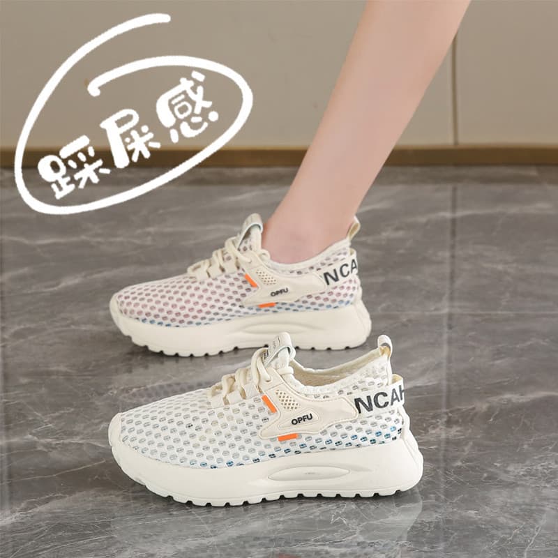 Putian malha sapatos femininos 2025 estilo de venda quente merda-piso inverno respirável oco Casual corrida leve sapatos