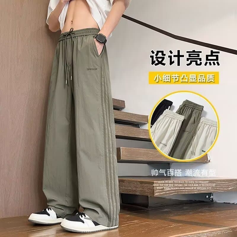Calças casuais masculinas de seda gelo verão 2026 novo estilo solto moda paraquedista Drape calças de perna larga estilo
