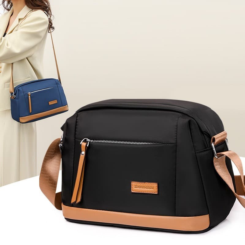 a Bolsa Mensageiro Feminina É À Prova D'água E Resistente Ao Desgaste Está Disponível Em Uma Variedade De Cores .